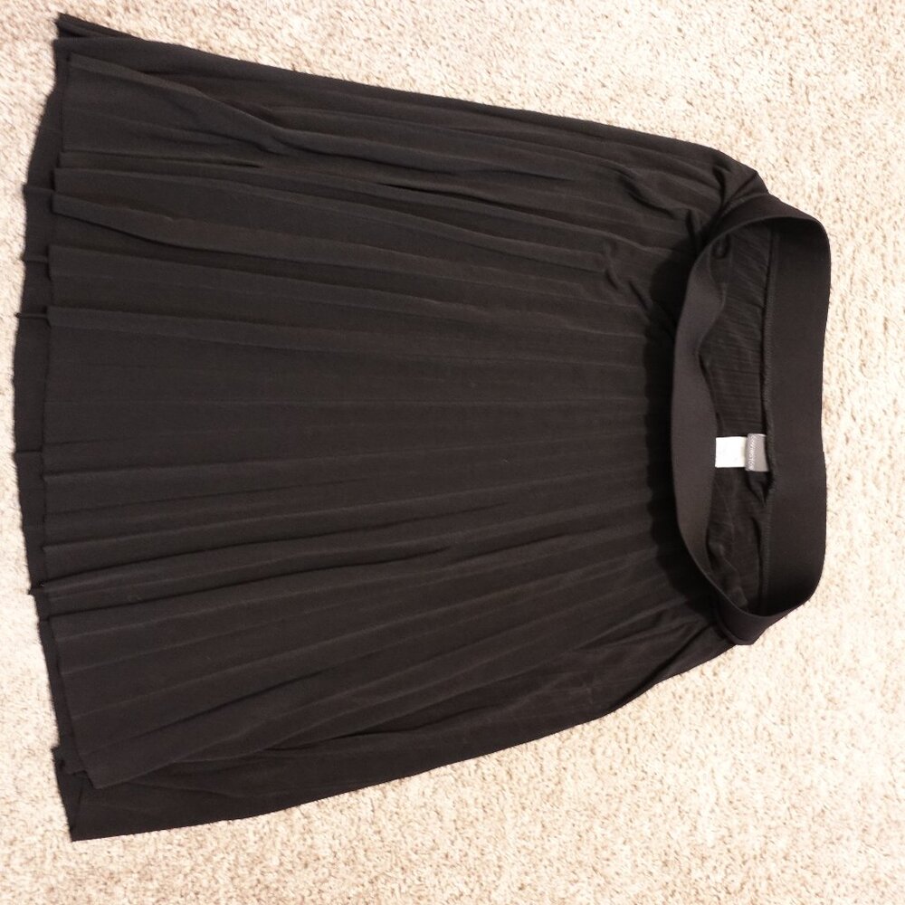 Pretty black skirt from Covington. Size L